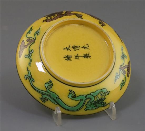 A Chinese yellow ground green and aubergine enamelled dragon dish, Guangxu mark and possibly of the period, D. 11cm